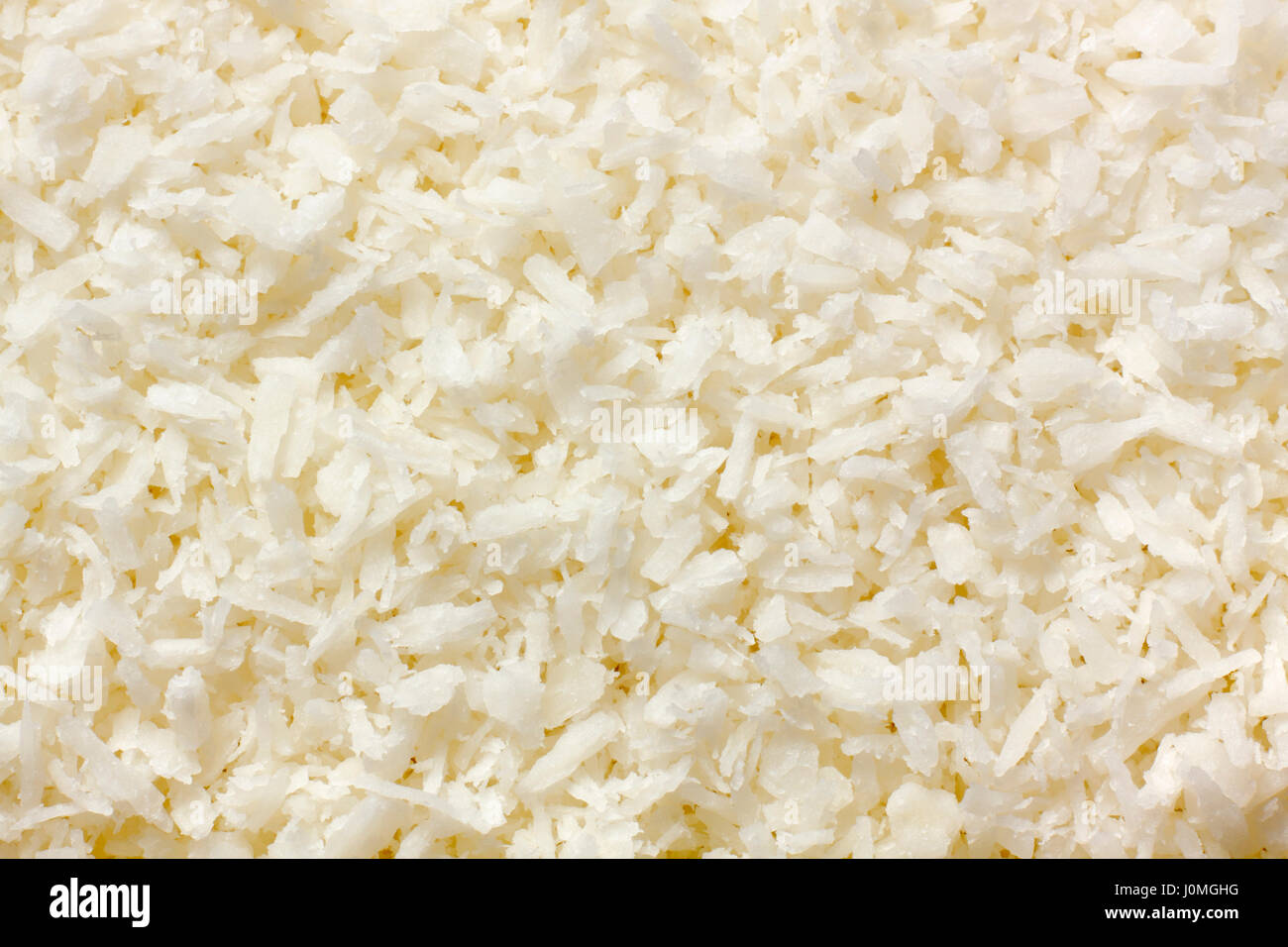 Kokosraspeln Kernel (Kopra) close-up. Full-Frame, Ansicht von oben. Stockfoto