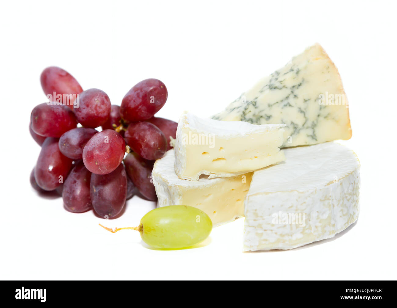 Schön lecker Käse vom Brett auf einem weißen Stockfoto