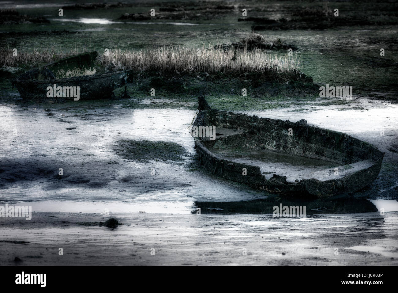 Boot-Wracks in Löcher Bay, Poole, Dorset, England, UK Stockfoto