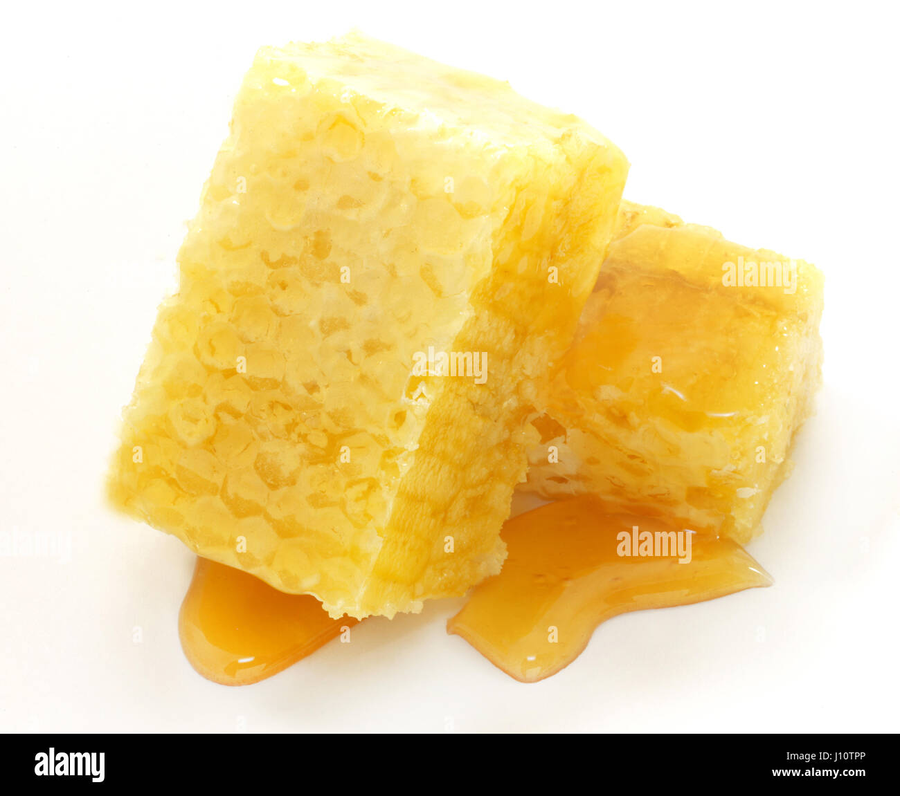 Leckere Waben mit Honig isoliert auf einem weißen Hintergrund zu fotografieren, Nahaufnahme Stockfoto