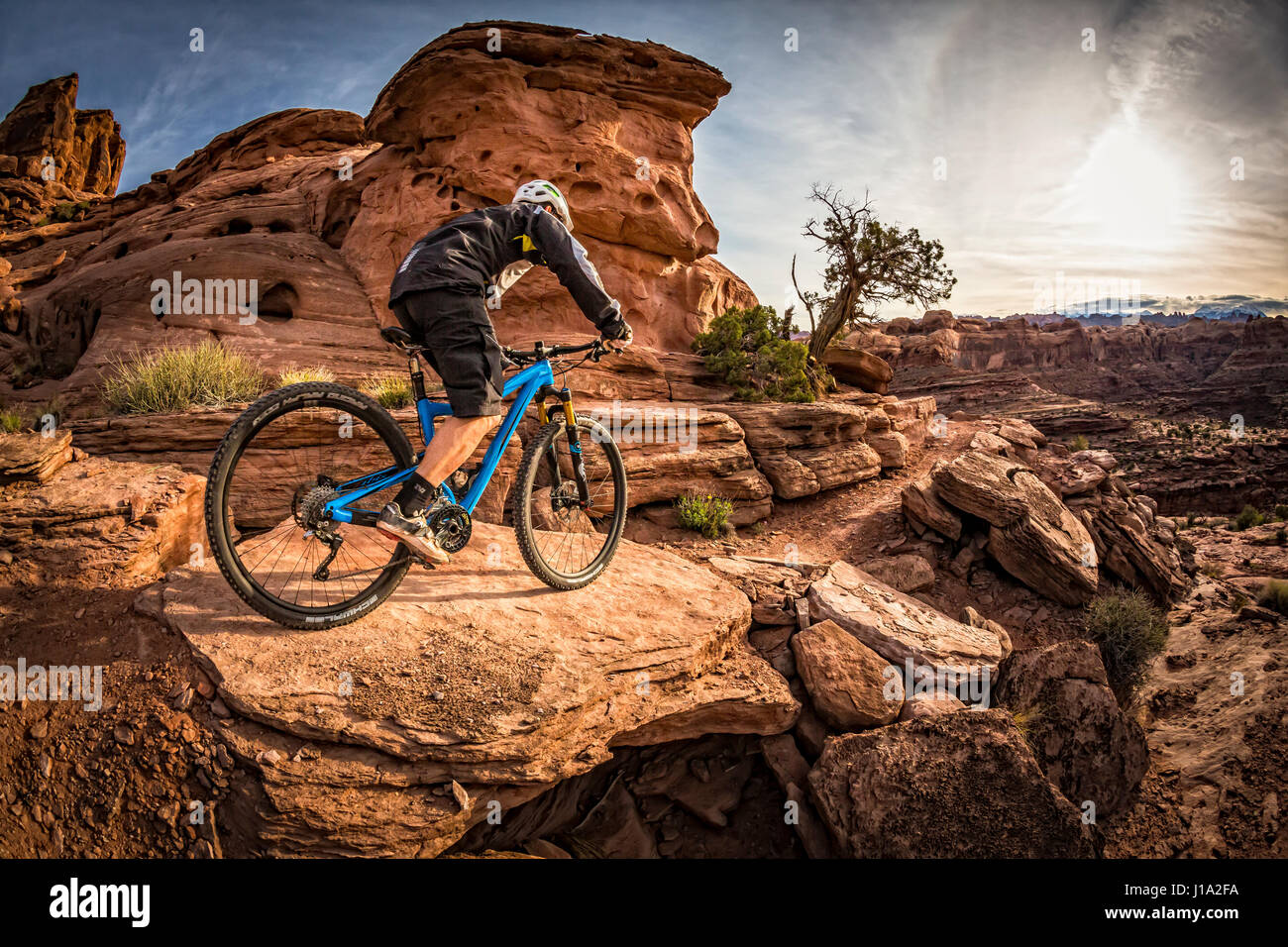 Kyle Mears Mountainbiken auf der Hymasa Trail, Moab, Utah. Stockfoto