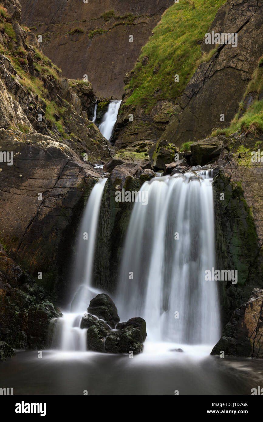 Spekes Mühle Mund Wasserfall in Nord West Devon. Stockfoto
