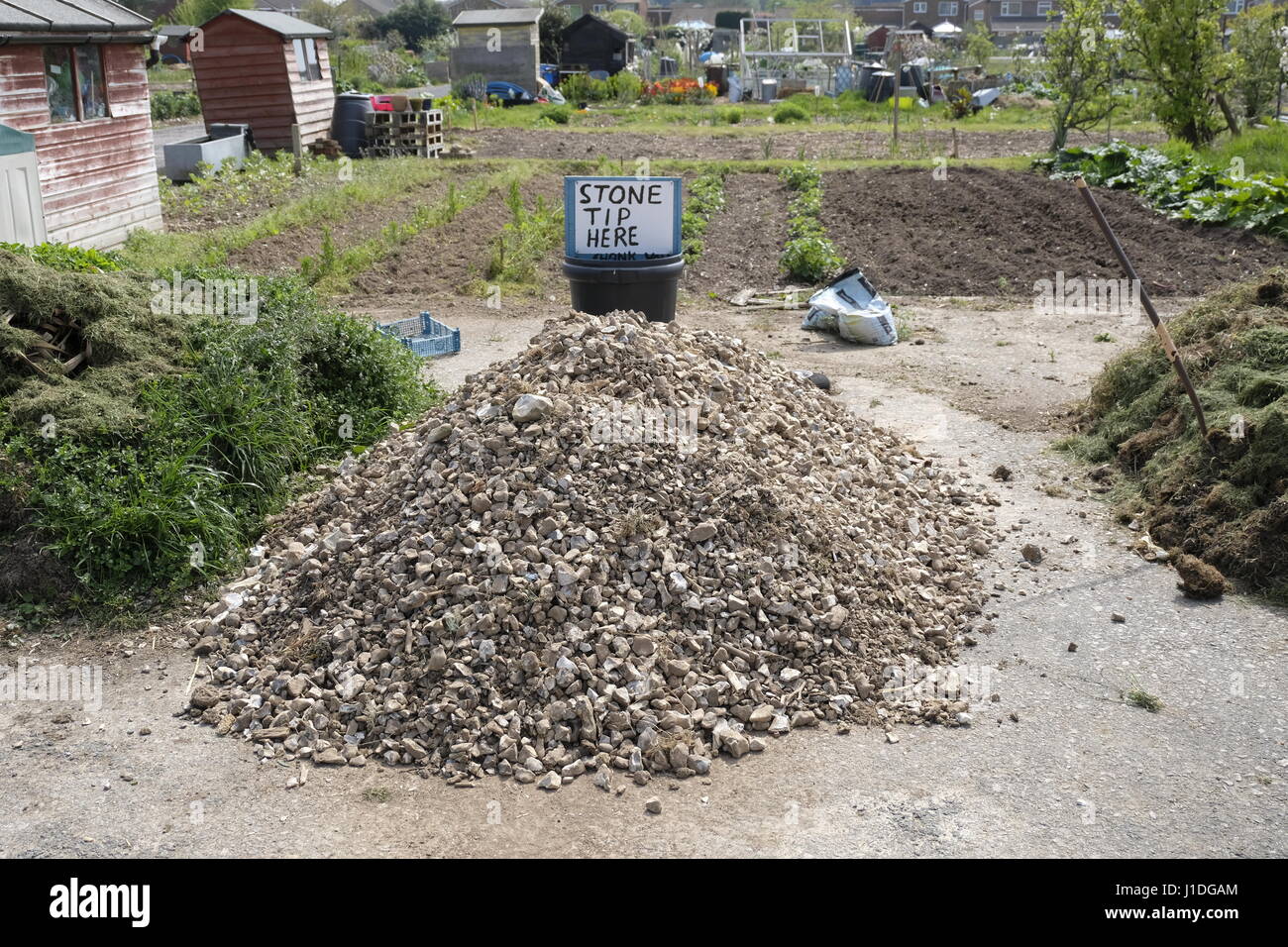 Stein-Tipp am UK Zuteilung. Vorgesehenen Zuteilung Inhaber Steinen aus ihrer Grundstücke Dump Stockfoto
