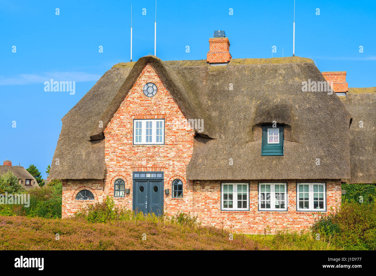Typisch friesische Haus mit Reetdach auf der Insel Sylt, Deutschland Stockfoto
