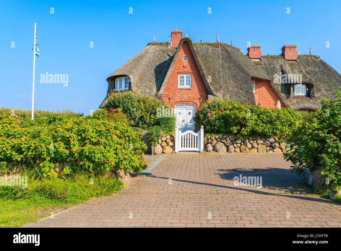 Typisch friesische Haus mit Strohdach in Kampen auf Sylt Insel, Deutschland Stockfoto