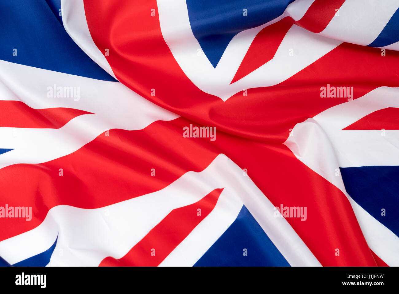 Zerzauste britische Flagge / Union Jack als Metapher für das Konzept der britischen Parlamentswahl 2017 - die Brexit-Wahl, Made in Britain, Best of British. Stockfoto