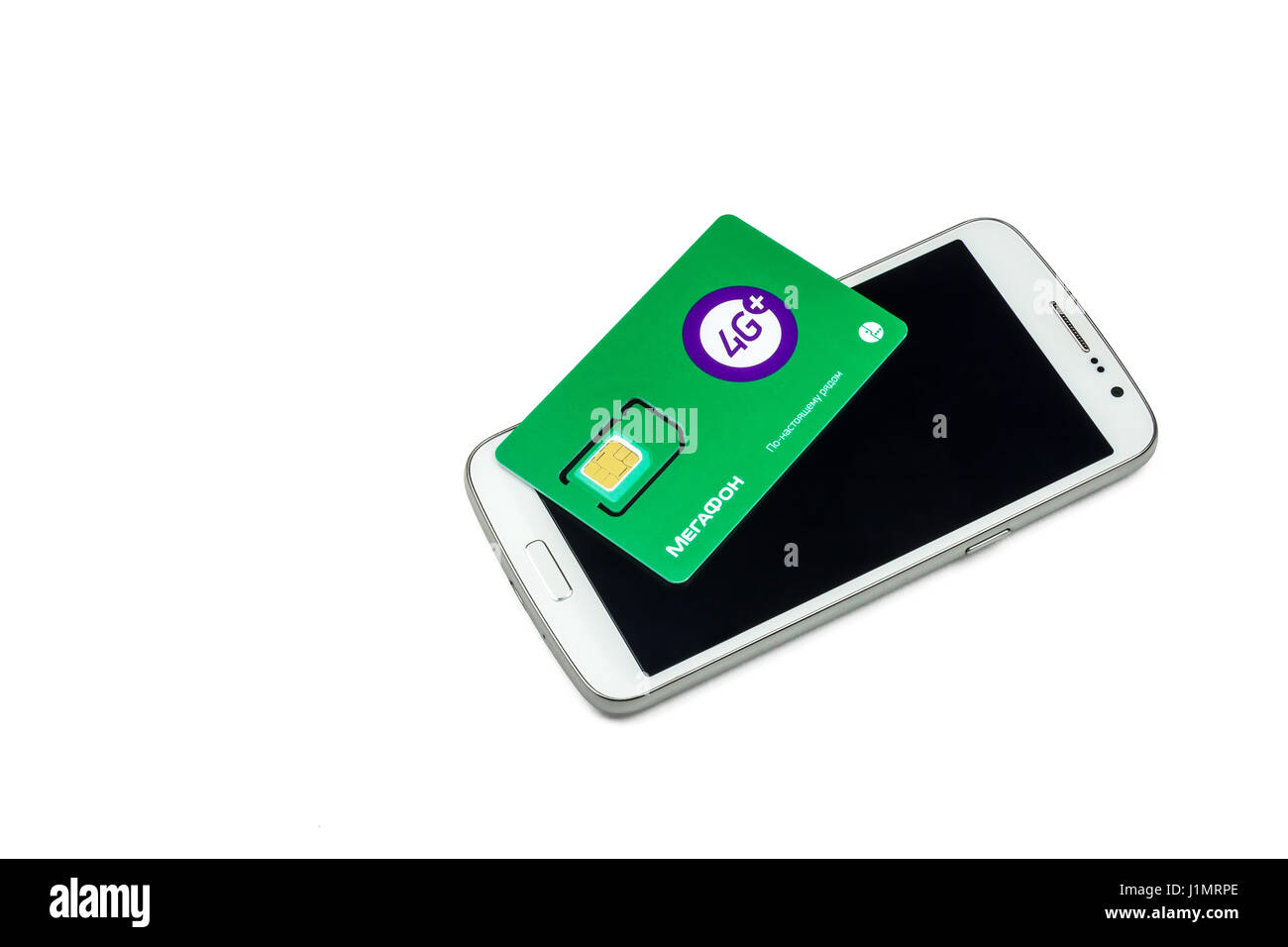 Smartphone und SIM-Karte des Betreibers des Mobilfunkes mit Funktion 4G + Stockfoto