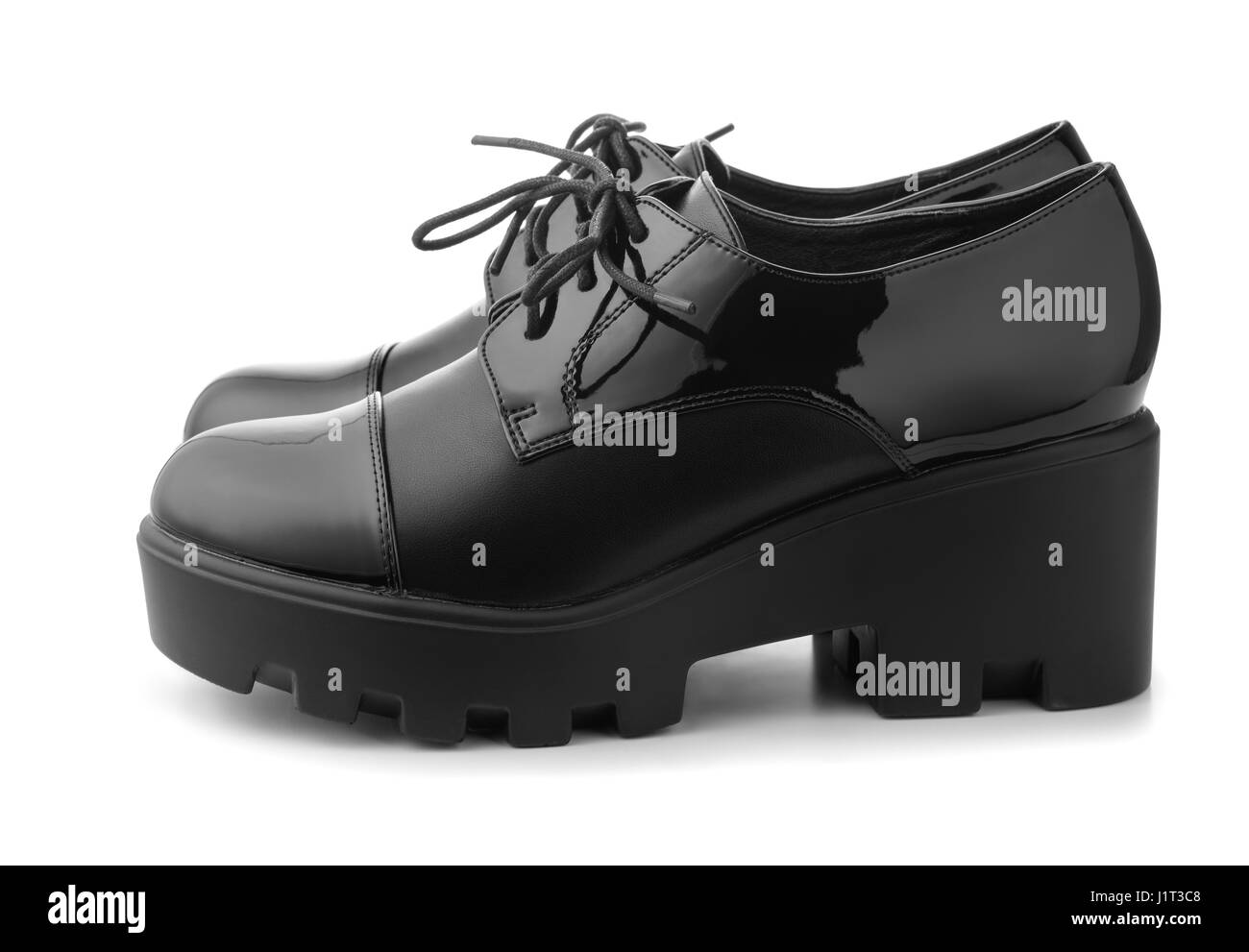 Schwarzes Leder Damenstiefel isoliert auf weiss Stockfoto