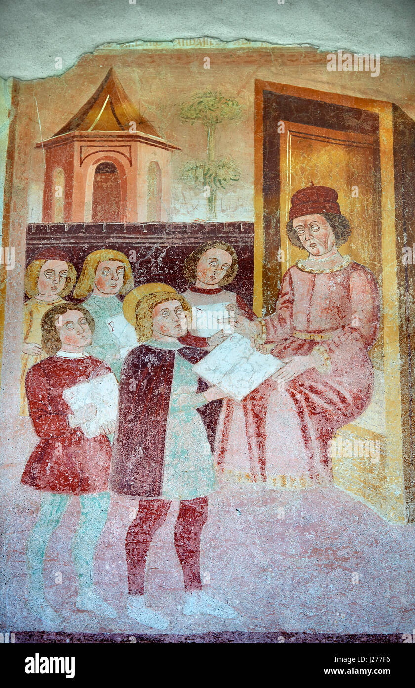 Religiöse Wandgemälde an der Außenseite von der gotischen Kirche von San Antonio Abate, die Leben von St. Antonio Abate von Dionisio Baschenis (ca. 1493), Stockfoto