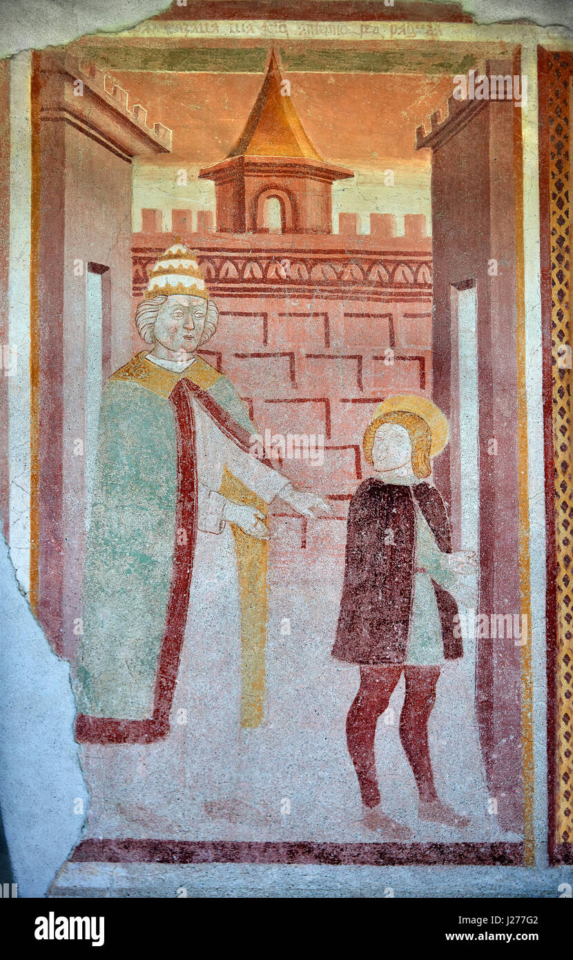 Religiöse Wandgemälde an der Außenseite von der gotischen Kirche von San Antonio Abate, die Leben von St. Antonio Abate von Dionisio Baschenis (ca. 1493), Stockfoto