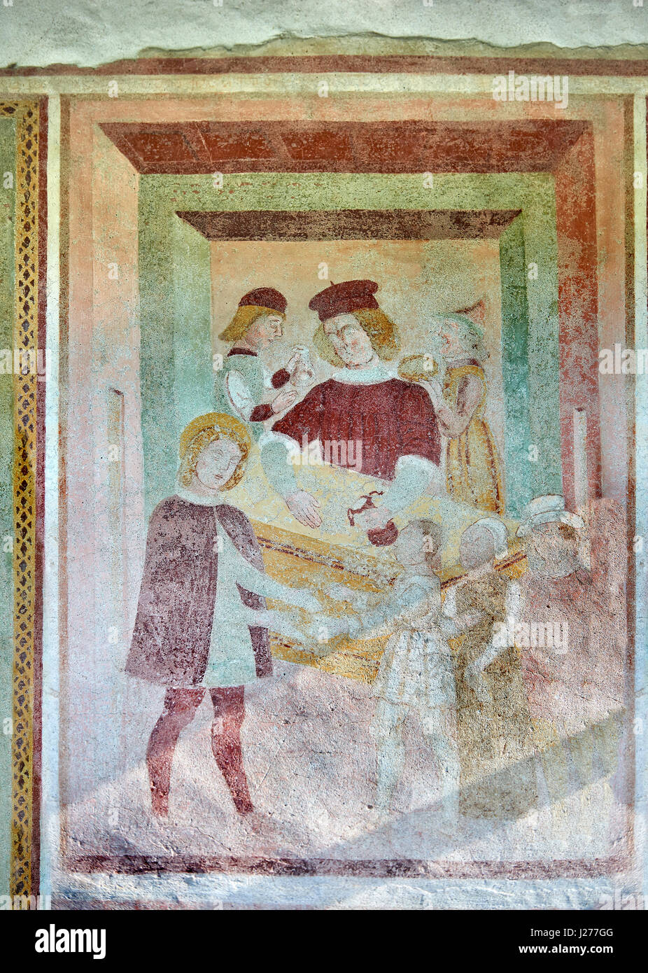 Religiöse Wandgemälde an der Außenseite von der gotischen Kirche von San Antonio Abate, die Leben von St. Antonio Abate von Dionisio Baschenis (ca. 1493), Stockfoto