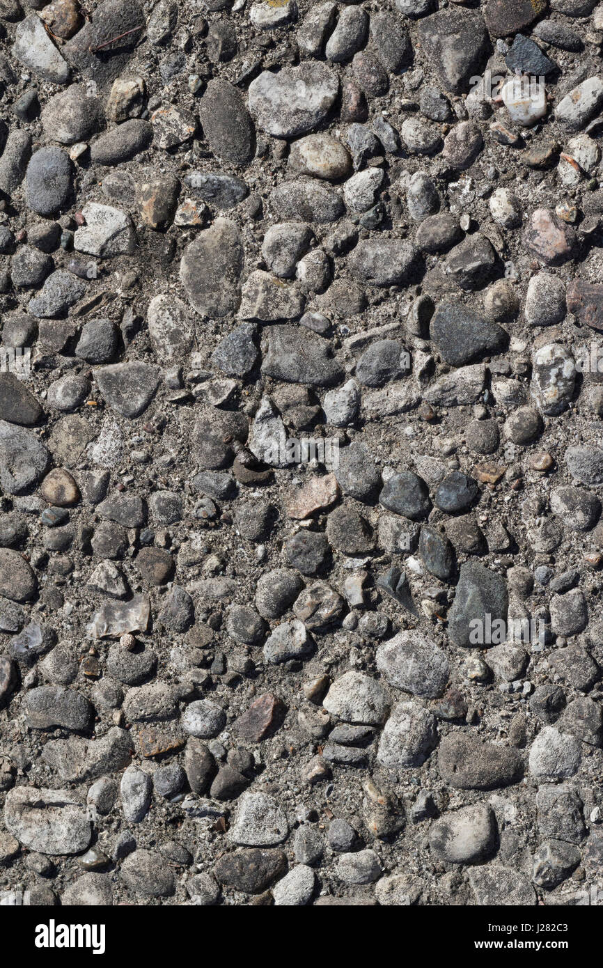 Steinen oder Kies Textur draußen fotografiert. Stockfoto