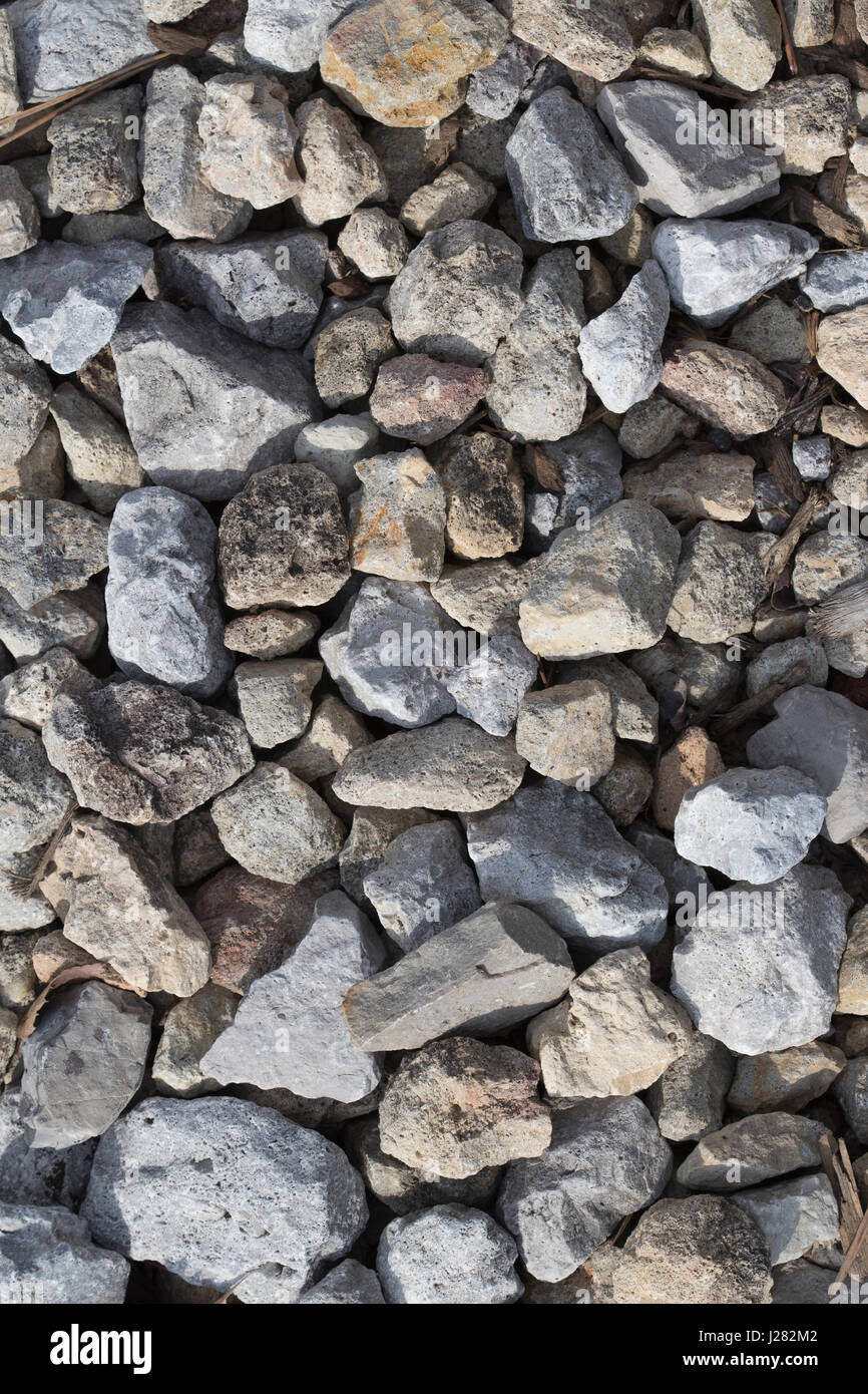 Steinen oder Kies Textur draußen fotografiert. Stockfoto