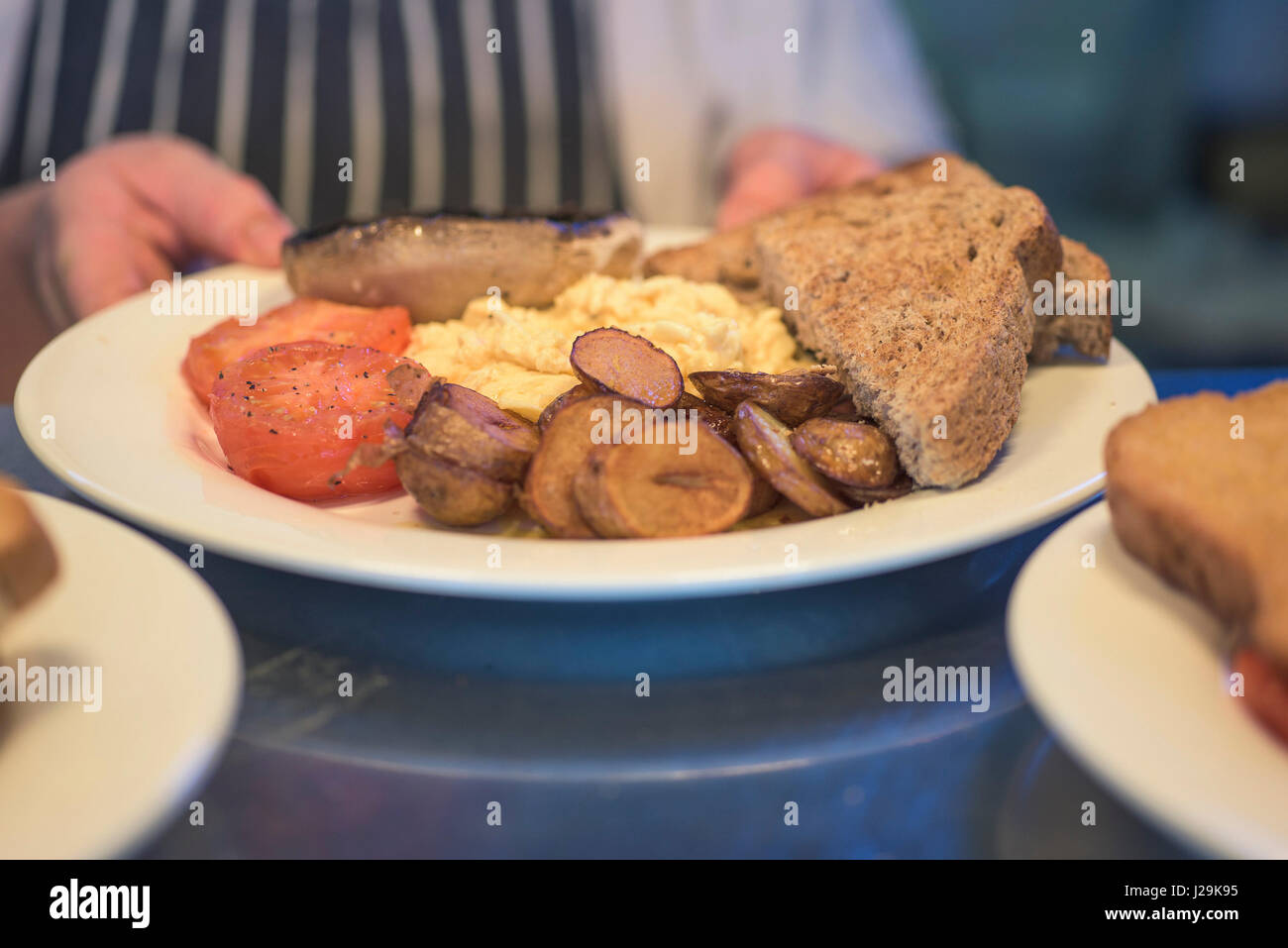 Frühstück Fry up Food Teller mit essen gebratene Speisen servieren Stockfoto