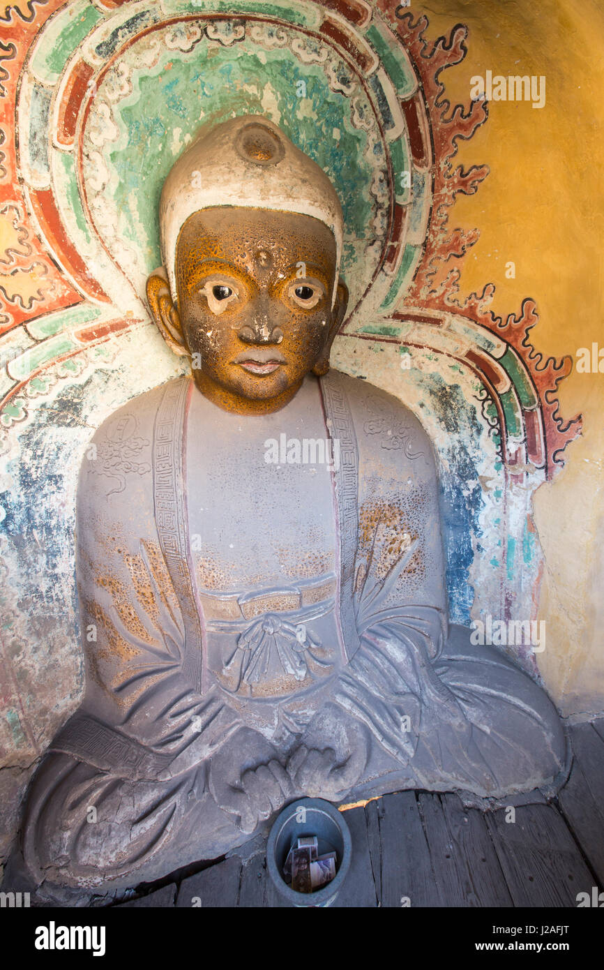 China, Provinz Shanxi, antike Buddha Skulptur in hängenden Palast (Xuankong Tempel) Seite des Berges Hang Shen eingebaut. Stockfoto