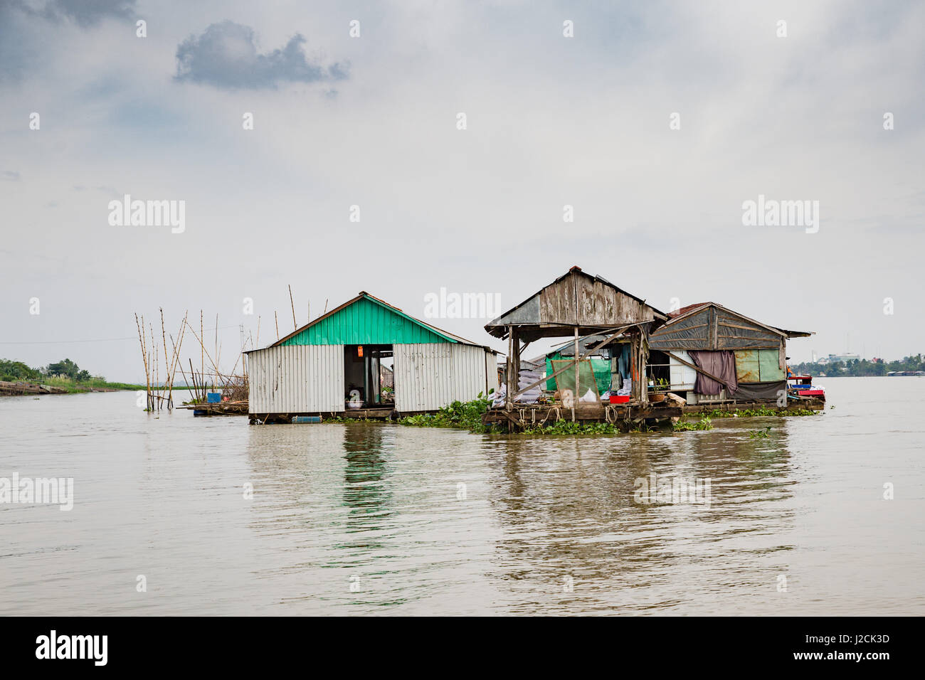 Cồn Sơn, Bùi Hữu Nghĩa in der Nähe von Cần Thơ, Hauptstadt und größte Stadt im Mekong DeltaBy Boot überqueren Sie den Mekong auf die Insel. Fischer-Häuser Stockfoto