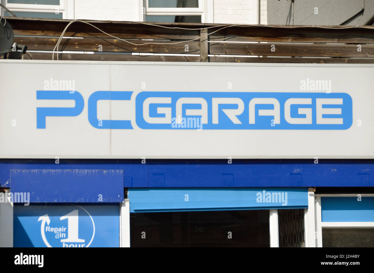 PC-Garage Zeichen über einem Laden. Stockfoto