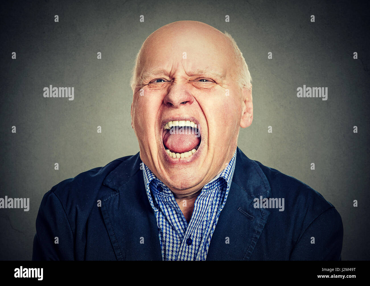 Porträt von senior zorniger Mann Stockfoto
