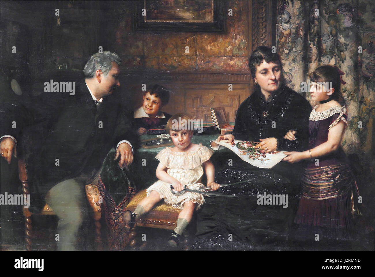 Ein Porträt einer Familie versammelt an einem Tisch, von Pierre Jean Van der Ouderaa Stockfoto