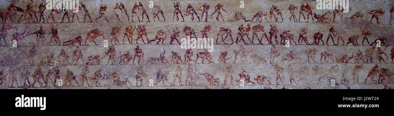 Ein detailliertes Bild einer Szene aus Grab 15 in Beni Hassan in Ägypten, die Wrestler zeigt. Dieses Grab, berühmt für seine lebendigen Darstellungen des altägyptischen Alltags, bietet Einblicke in Sport und Rituale der damaligen Zeit. Stockfoto