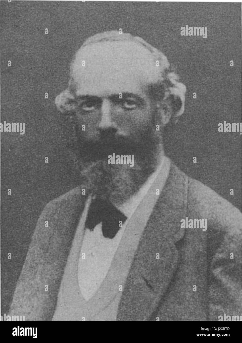 August Kekulé, ein deutscher Chemiker, ist vor allem für seine Entwicklung der Strukturtheorie der organischen Chemie bekannt. Dieses Porträt von 1873 spiegelt seine bedeutenden Beiträge auf dem Gebiet wider, einschließlich der Entdeckung der Benzolringstruktur. Stockfoto