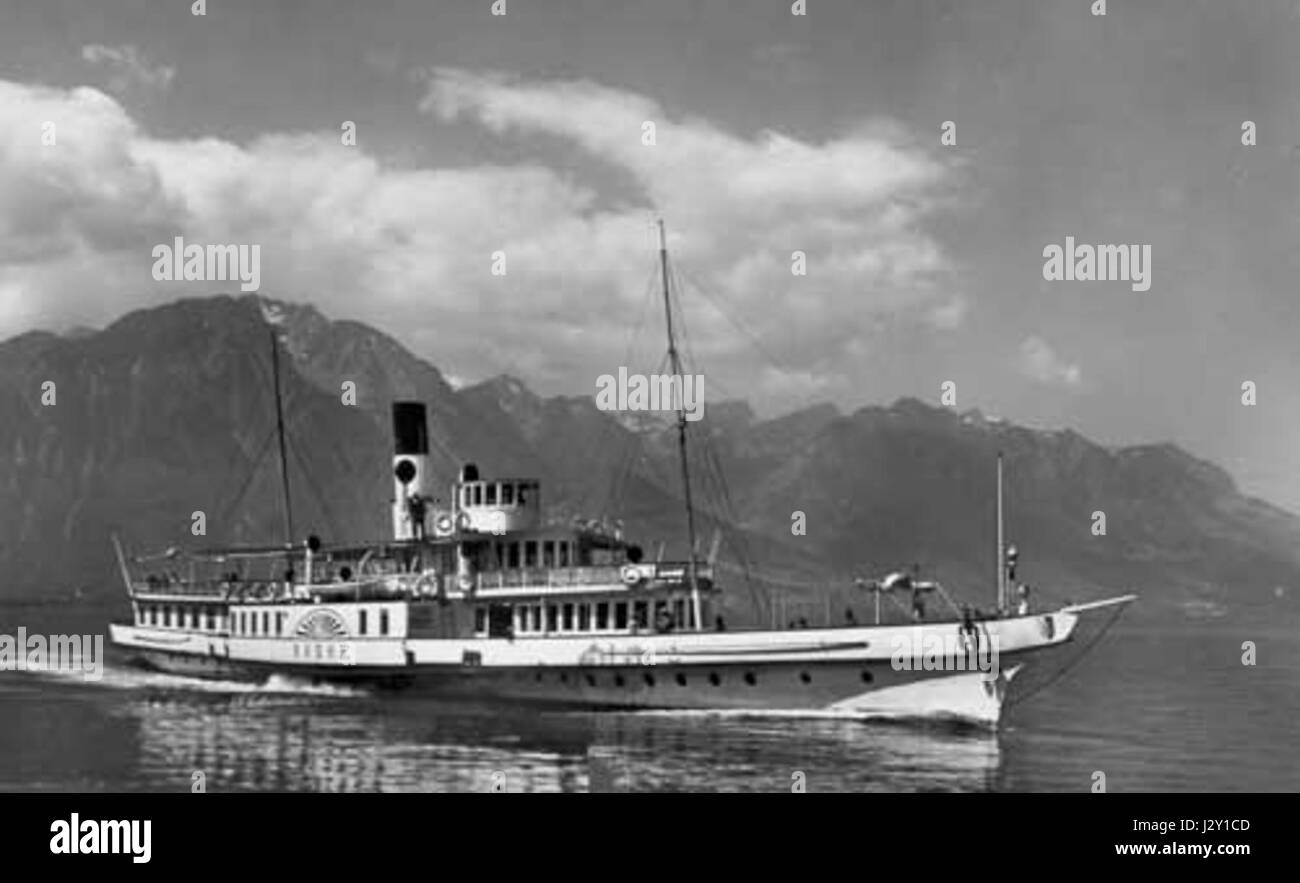 Diese Fotografie aus dem Jahr 1927 zeigt die Rhone in der Stadt CGN und erfasst die Rolle des Flusses im lokalen Leben und der Stadtentwicklung während des frühen 20. Jahrhunderts. Stockfoto Diese Fotografie aus dem Jahr 1927 zeigt die Rhone in der Stadt CGN und erfasst die Rolle des Flusses im lokalen Leben und der Stadtentwicklung während des frühen 20. Jahrhunderts. Stockfoto