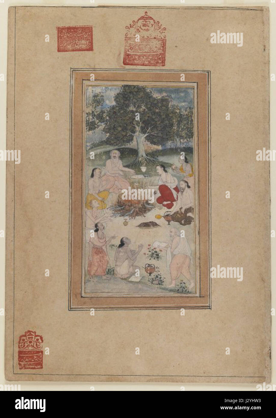Dieses Kunstwerk aus dem Brooklyn Museum zeigt eine Gruppe von hinduistischen Asketikern oder Sadhus, die um ein Feuer versammelt sind. Sadhus sind spirituelle Praktizierende im Hinduismus, die dafür bekannt sind, weltlichen Besitz zu entsagen und ein Leben zu führen, das auf Meditation und Hingabe ausgerichtet ist. Das Bild zeigt ihre religiösen Praktiken und ihren Lebensstil. Stockfoto