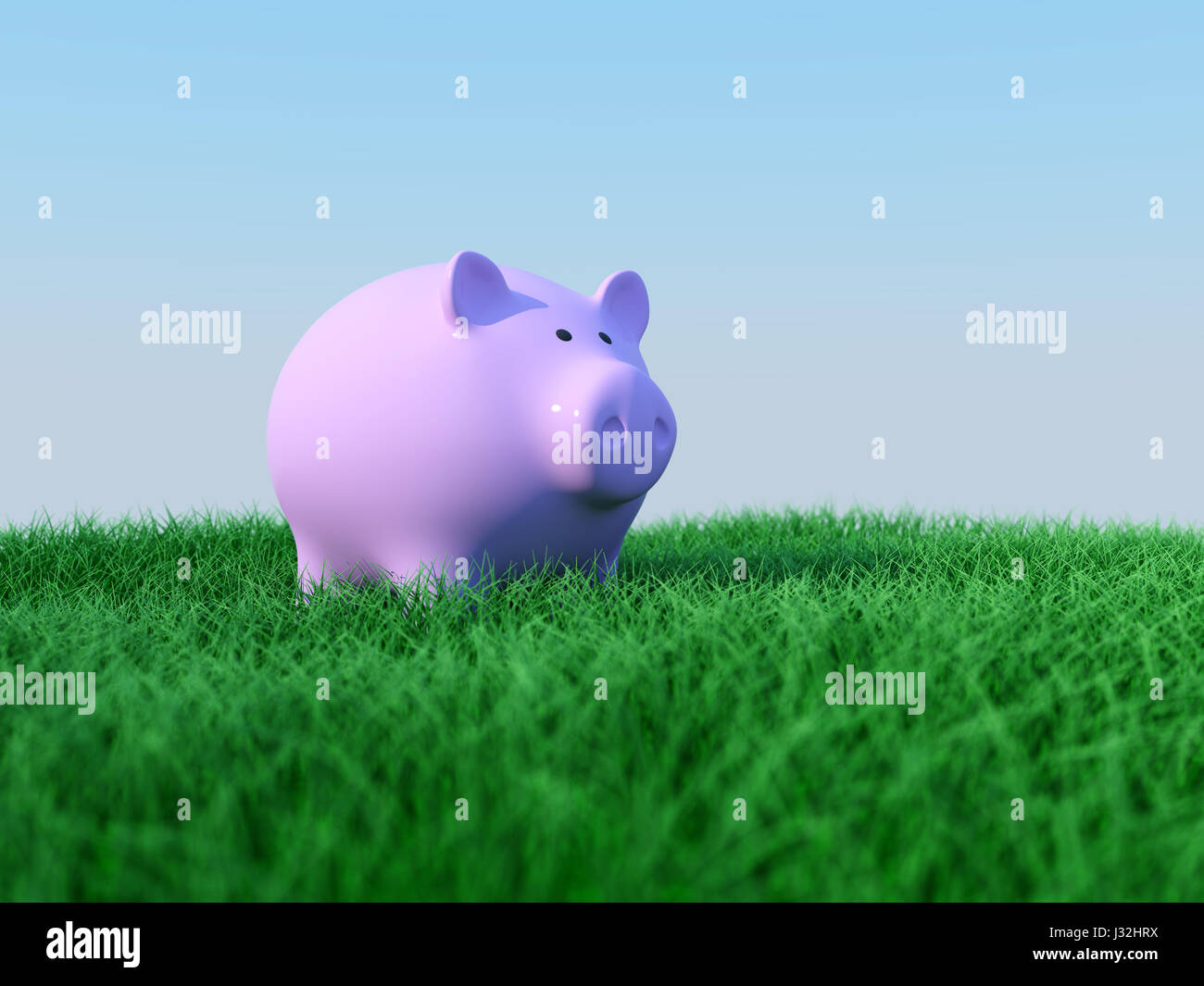 Sparschwein mit Grass Stockfoto