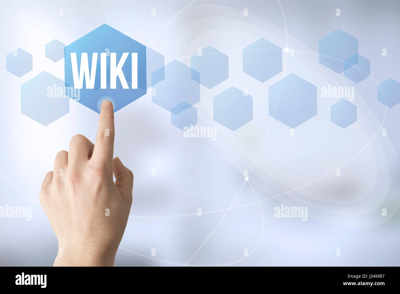 Hand zu berühren eine Touchscreen-Oberfläche mit wiki Stockfoto