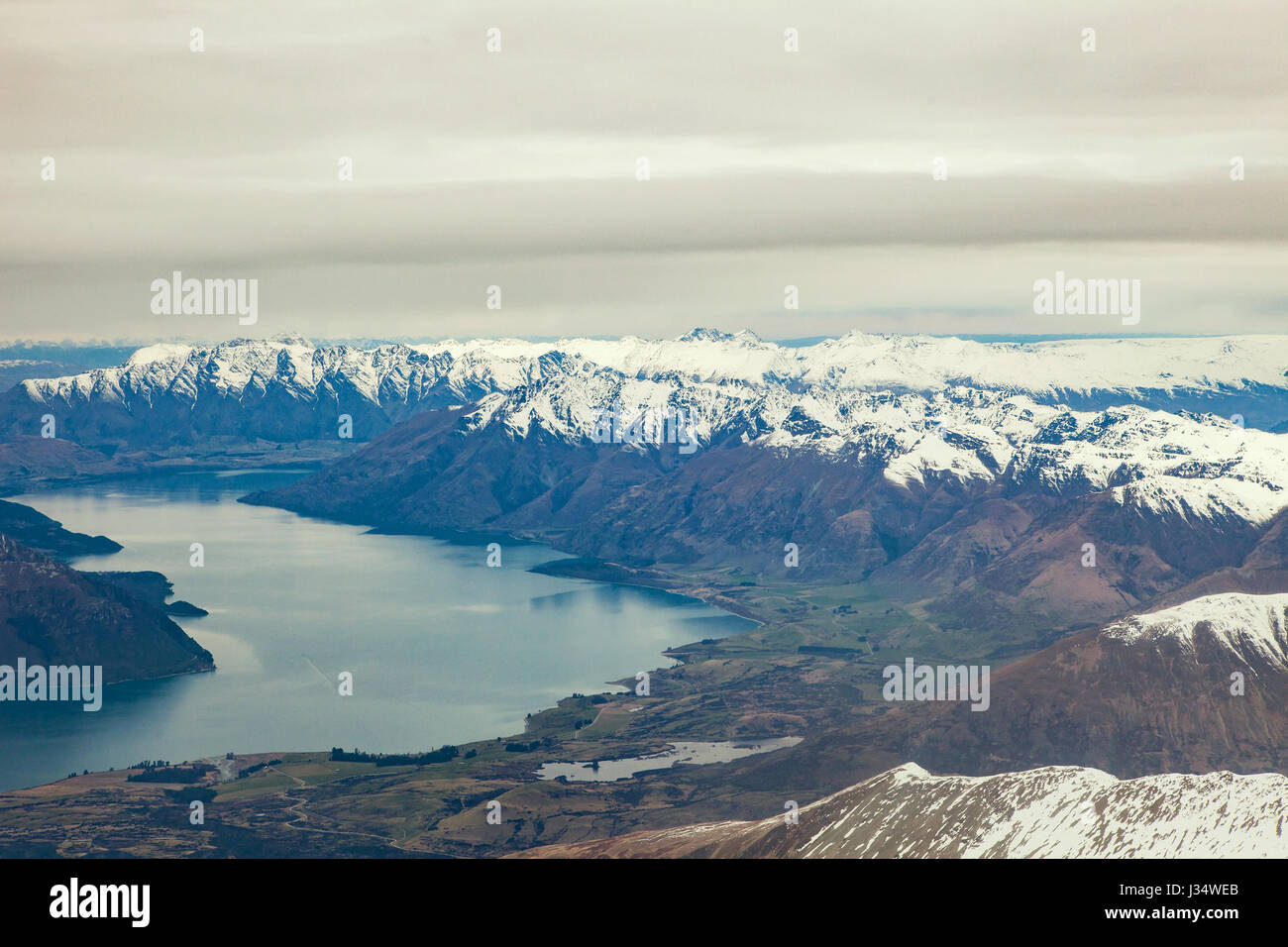 Landschaft-Schneeberg aus Flugzeugfenster Queentown Südinsel Neuseelands Stockfoto