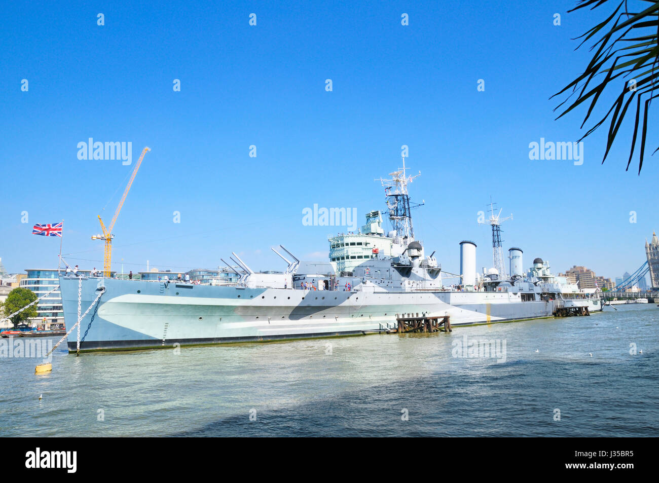 HMS Belfast vor Anker auf der Themse, London, England, UK Stockfoto