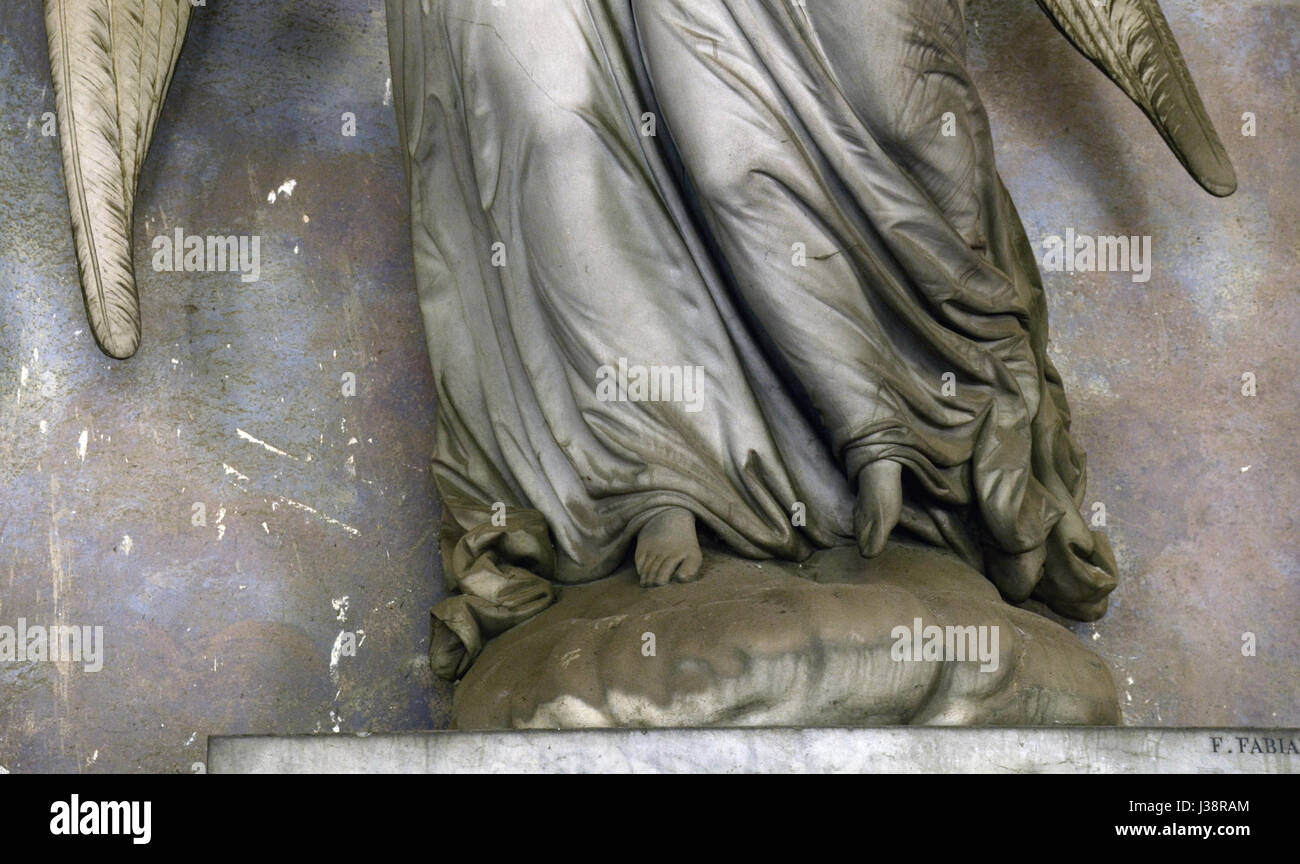 Auf dem Friedhof Staglieno in Genua, Italien, befindet sich das von F. Fabiani entworfene Grab der Familie Castello. Das Grab ist bekannt für seine komplizierten Skulpturen und detaillierten Grabkunst, die die italienische künstlerische Tradition widerspiegelt. Stockfoto