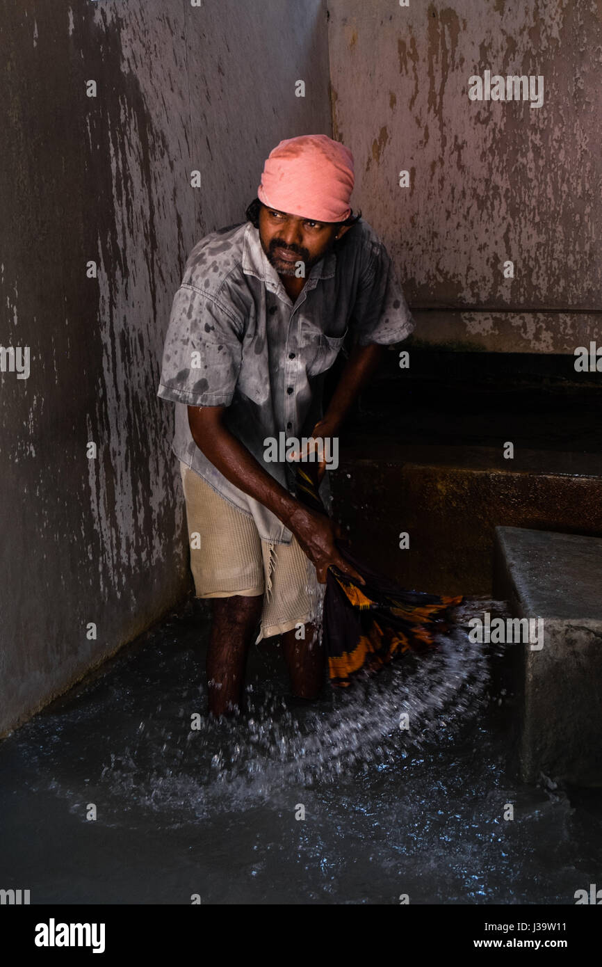 Dhobi Waschmaschinen/Wäscheservice Arbeitnehmer in Cochin ist Waschhaus Stockfoto
