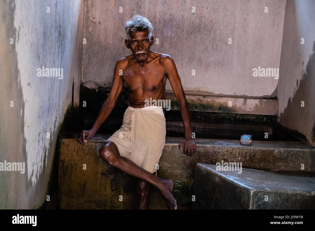 Dhobi Waschmaschinen/Wäscheservice Arbeitnehmer in Cochin ist Waschhaus Stockfoto