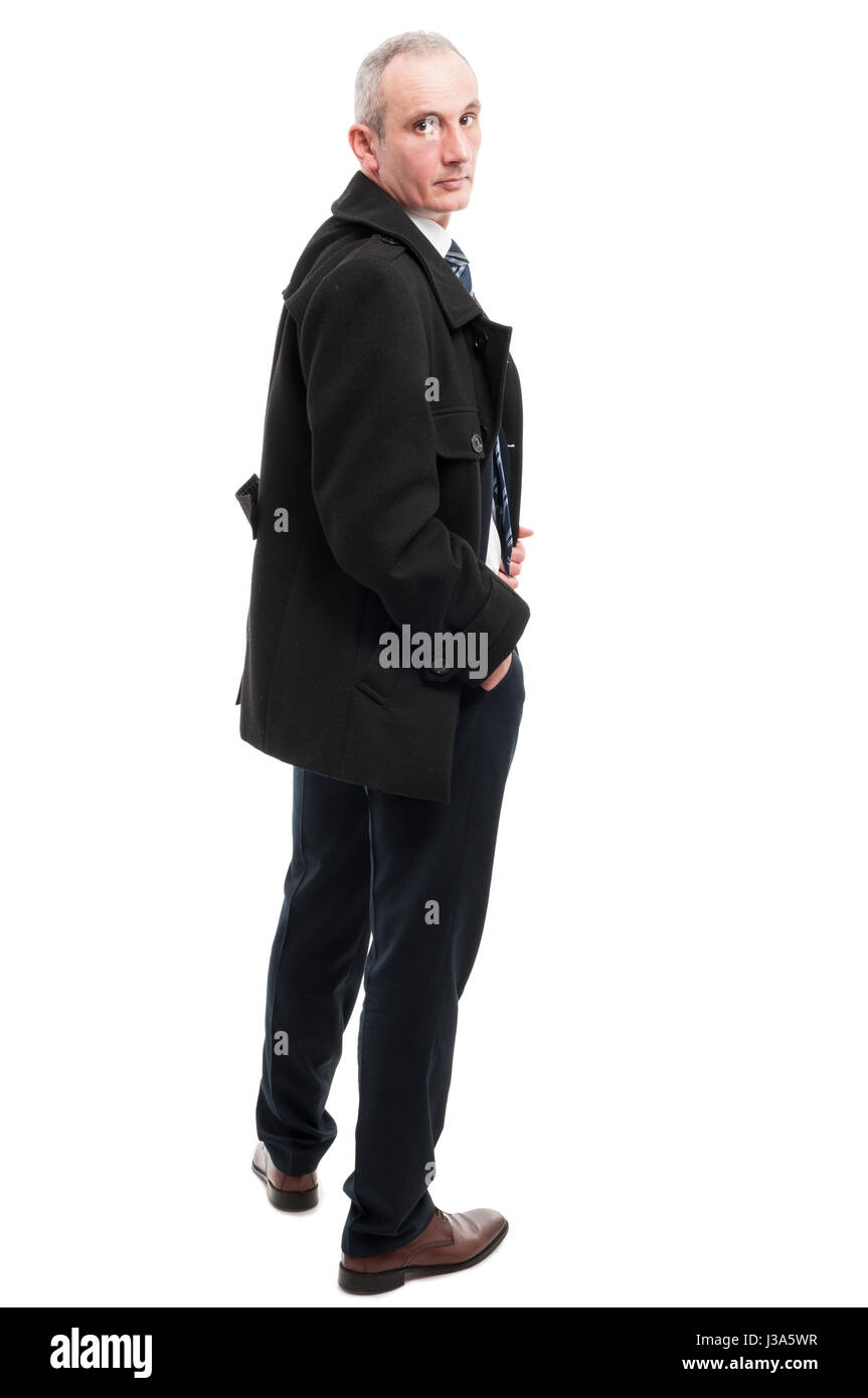 Ganzkörper von eleganten Mann posiert mit Hand in der Tasche isoliert auf weißem Hintergrund Stockfoto