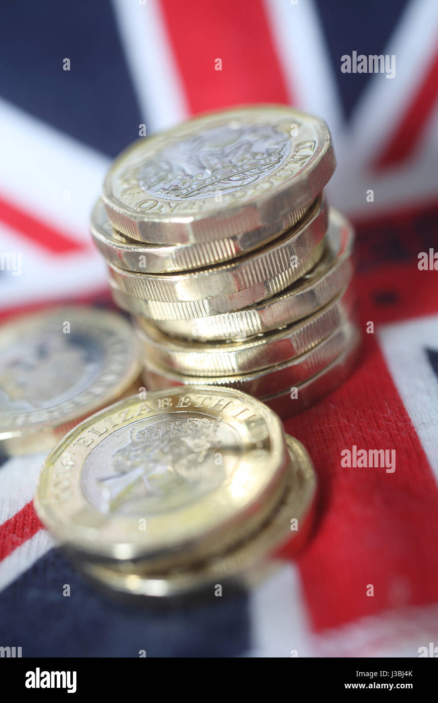 Neue 1 Pfund-Münzen auf Union Jack Hintergrund, UK Stockfoto