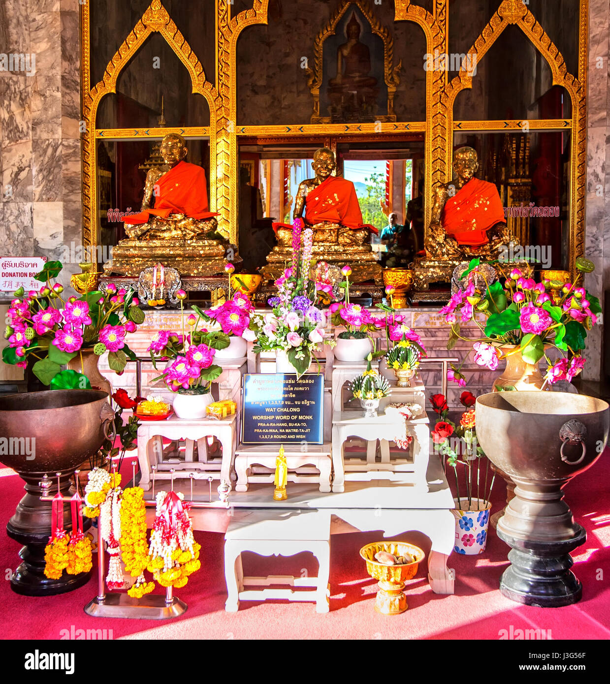 Statuen der Mönche in Wat Chalong Tempel, Insel Phuket, Thailand Stockfoto