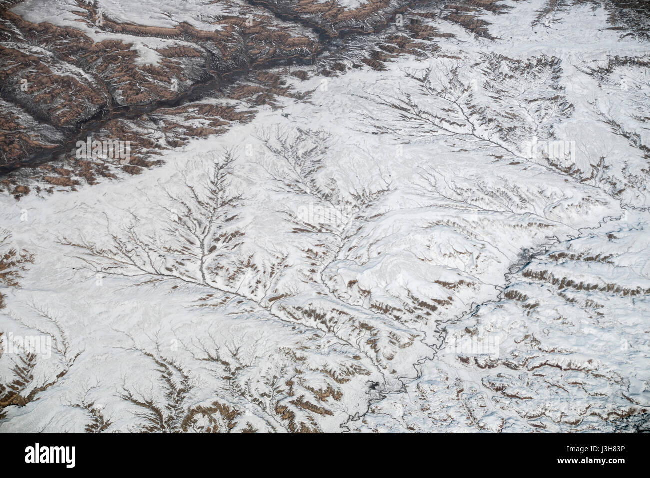 Luftaufnahme aus einem Flugzeug über den USA irgendwo über den Rocky Mountains auf einem Flug von Jackson Hole nach Salt Lake City zu fliegen. Stockfoto