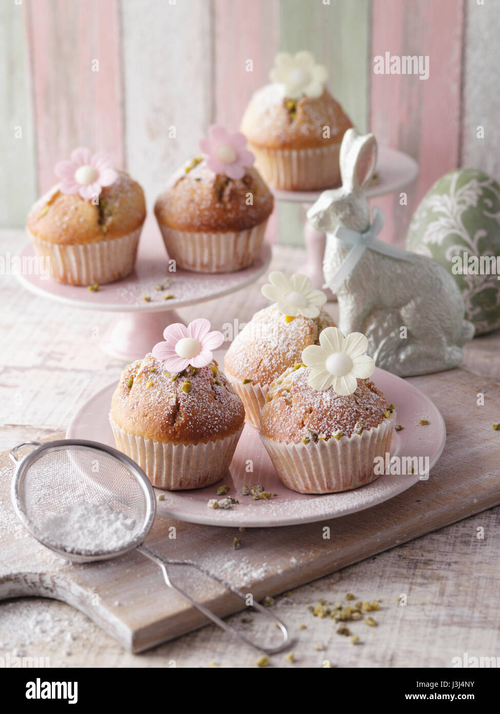Blümchen-Muffins Stockfoto