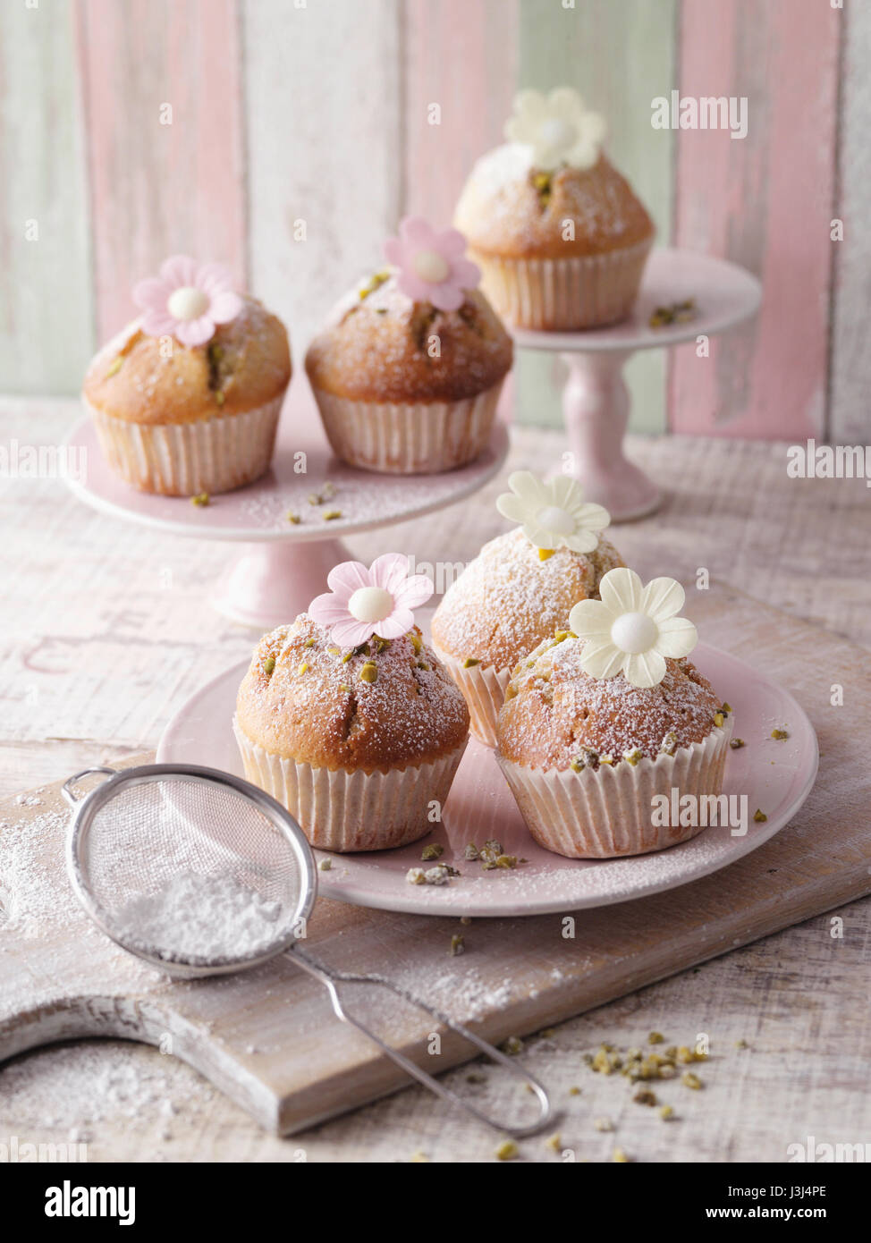 Blümchen-Muffins Stockfoto