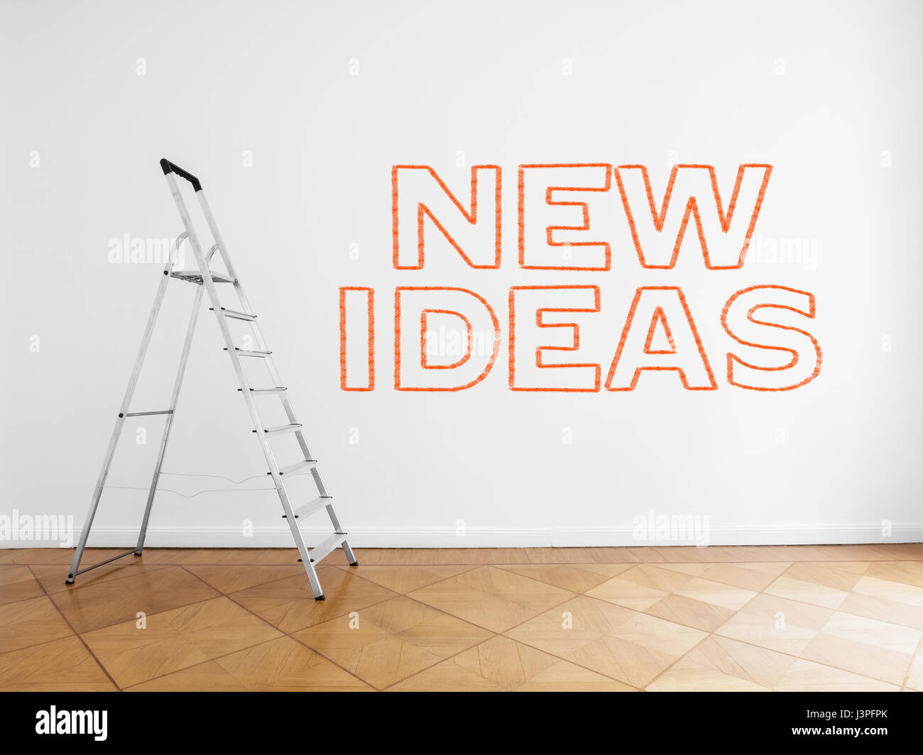 Zimmer mit Leiter und Text an Wand: neue Ideen Stockfoto