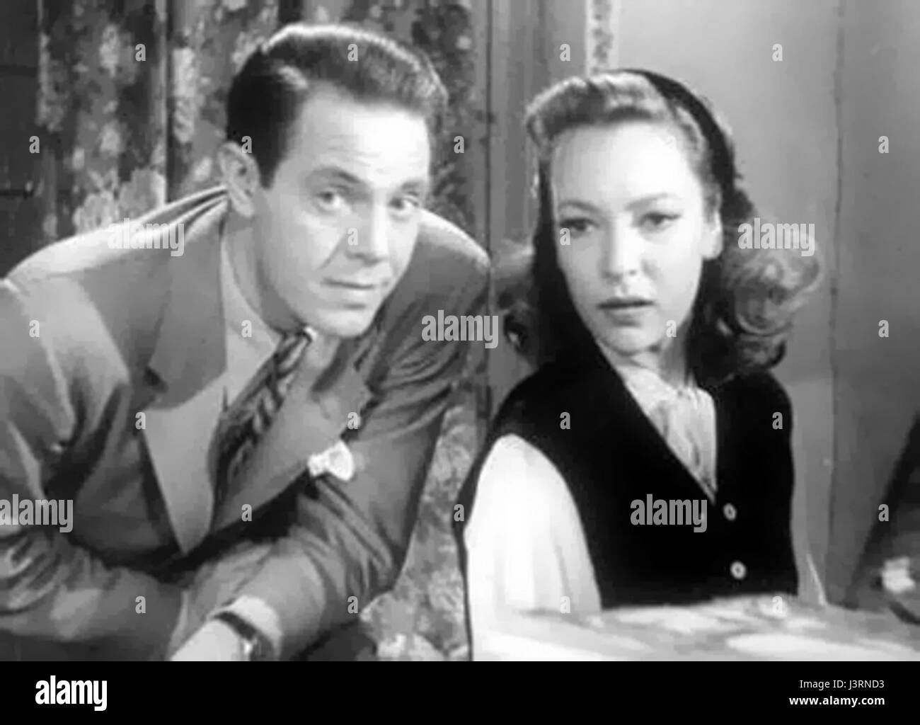 June Duprez und Louis Hayward waren prominente Schauspieler, die für ihre Arbeit in frühen Hollywood-Filmen bekannt waren. In den 1940er Jahren spielten sie in mehreren Filmen zusammen und trugen zum goldenen Zeitalter des Kinos bei. Stockfoto