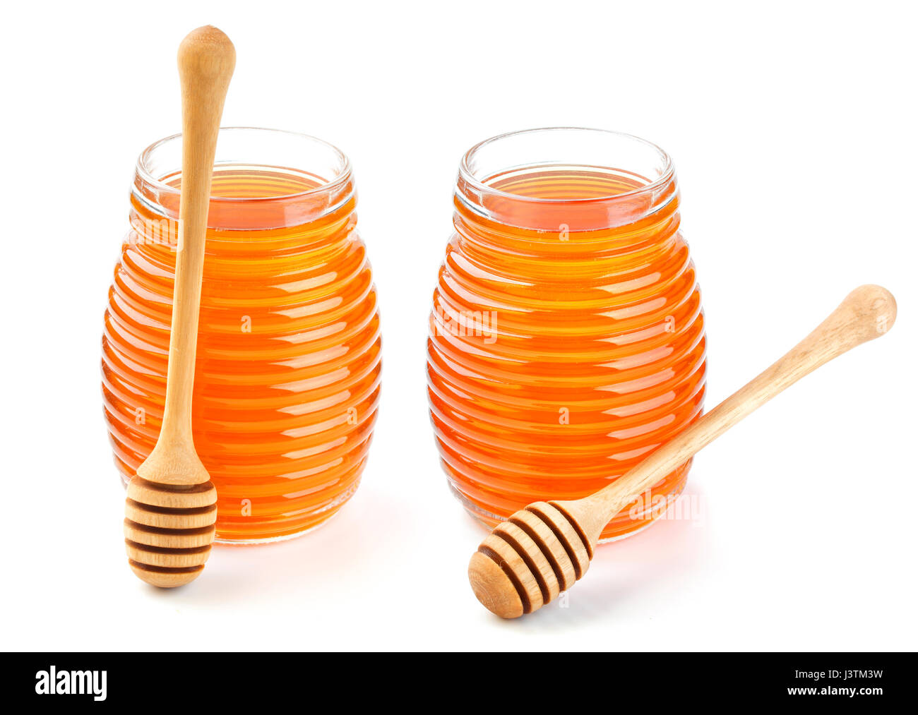 Honig im Glas jar isolierten auf weißen Hintergrund Stockfoto