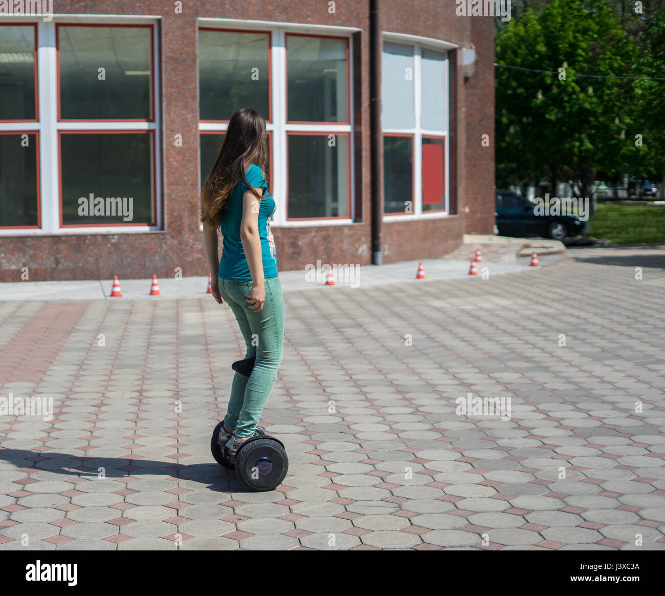 Frau Beine fahren, Gyroscooter oder hoverboard Stockfoto