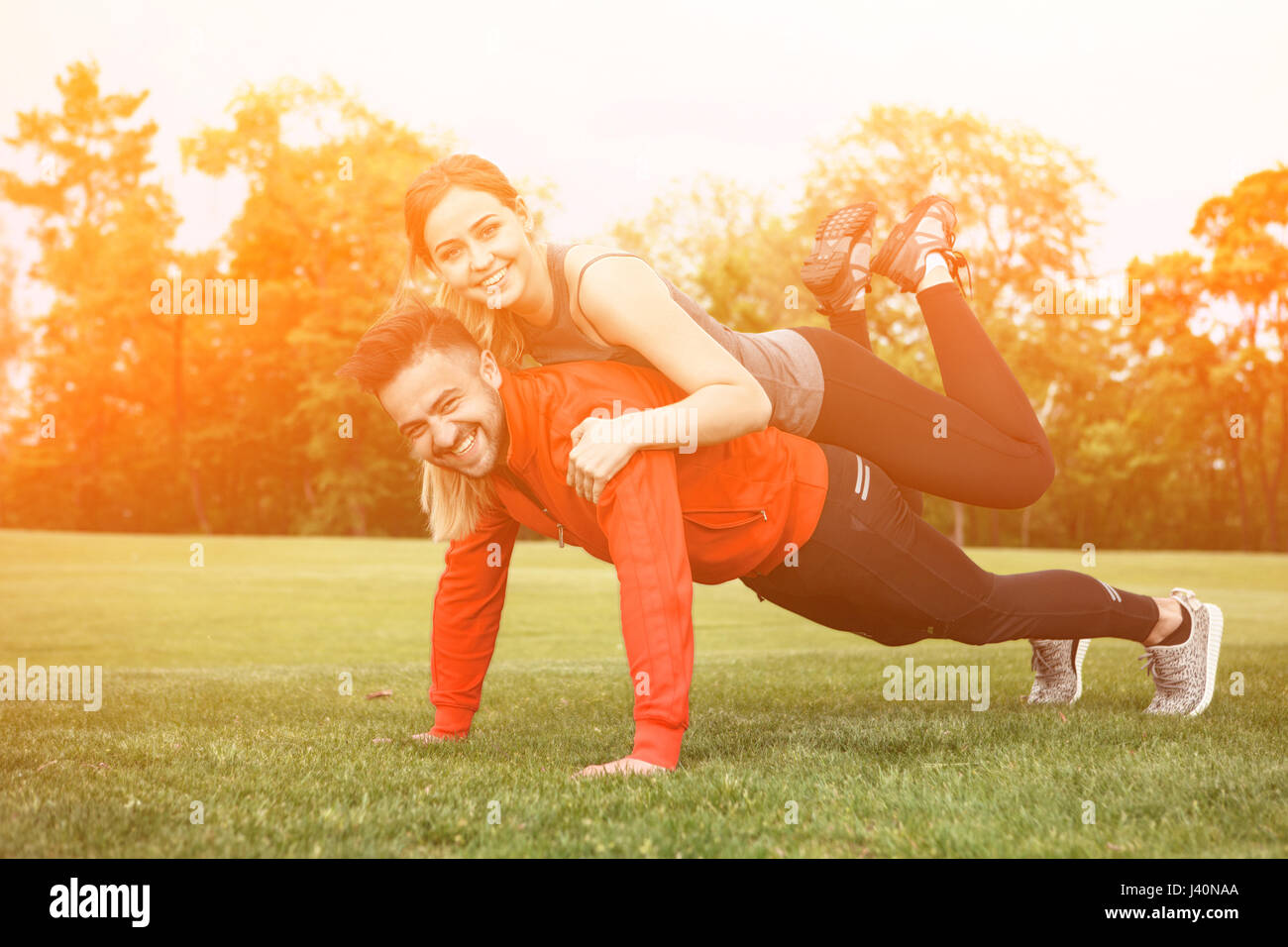 Sport-Mann und Frau im park Stockfoto