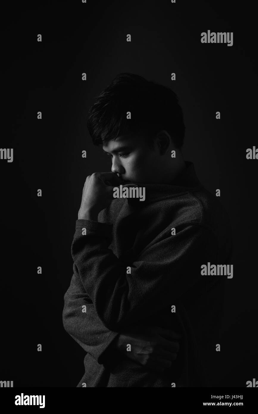 Porträt der traurige junge asiatische Männer. Traurigkeit Stockfoto