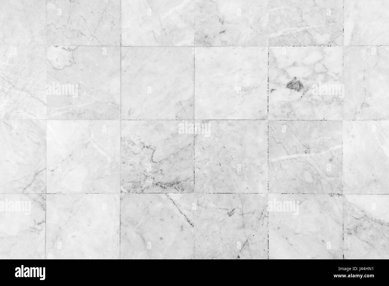 Nahaufnahme von einem glatten Marmorboden in schwarz & weiß von oben gesehen. Stockfoto