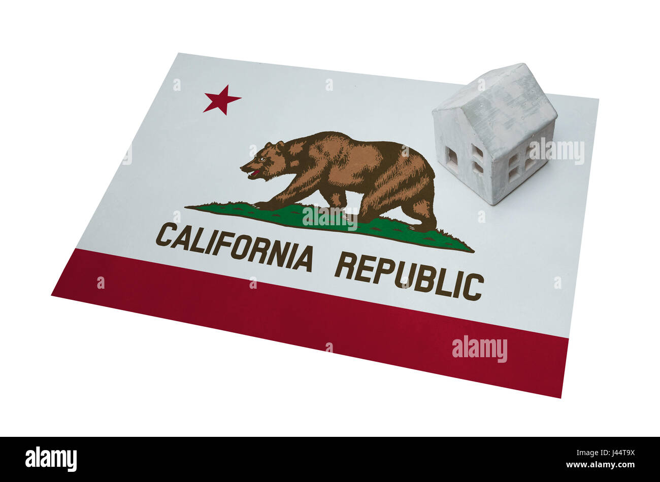 Kleines Haus auf eine Flagge - lebende oder migrieren nach Kalifornien Stockfoto