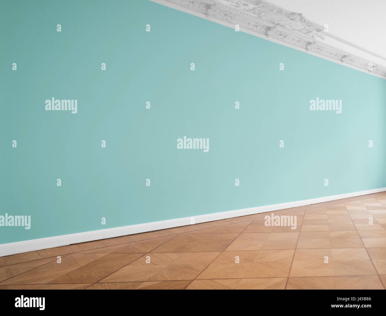 bemalte Wand Hintergrund im leeren Raum mit Holzboden Stockfoto