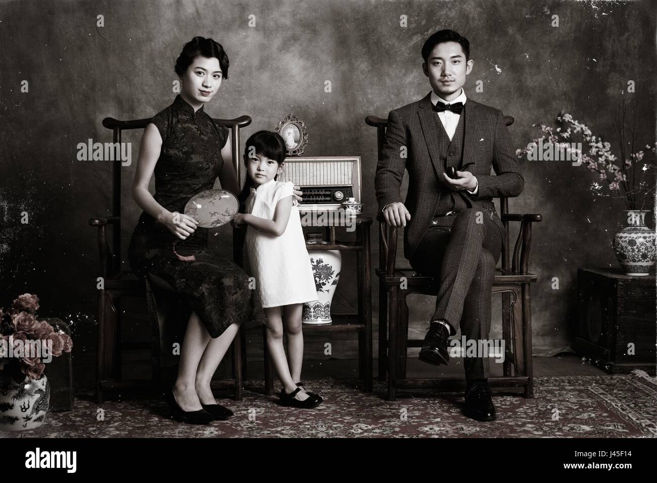 Klassischen Stil einer Familie von drei Foto Stockfoto